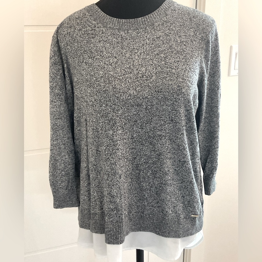 Calvin Klein Marbled Black/Gray with White Skirting.